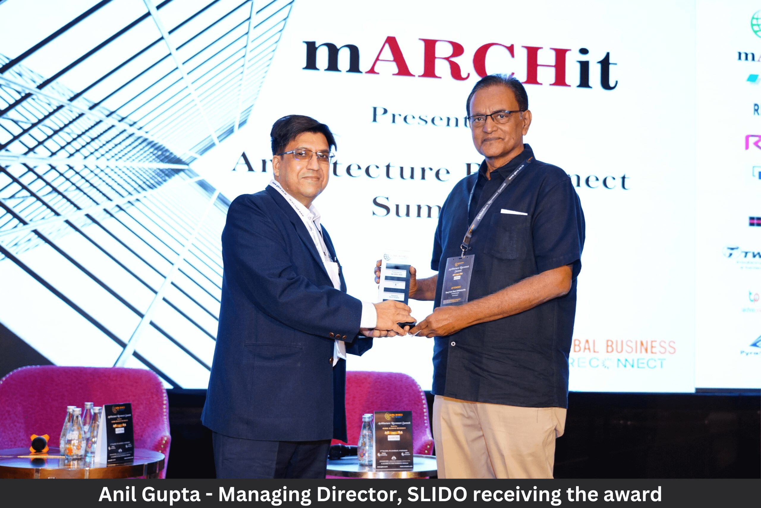 Anil Gupta Managing Director SLIDO receiving the award () ()